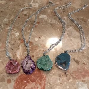 Four colored natural stone necklaces